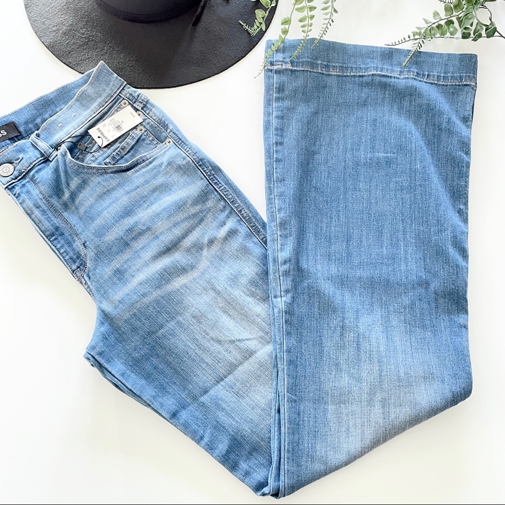 Express High waisted bell flare jeans.
Size 8 long. NWT  Blue. Zip and button.